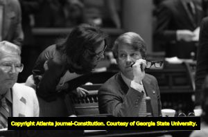Georgia Senator Culver Kidd, Representitive Cathey Steinberg, and Senator Pierre Howard during Senate debate on ratification of the Equal Rights Amendment, Atlanta, Georgia, January 21, 1980.