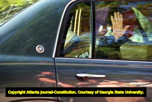 Mother Teresa waving from a car window, Atlanta, Georgia, June 13, 1995.