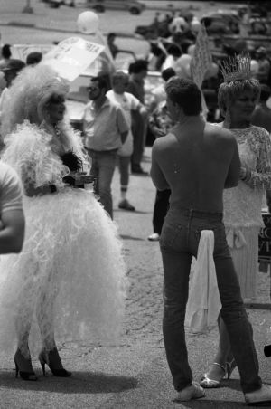 Drag queen and other participants in the 17th annual Gay Pride Parade, Peachtree Street, Atlanta, Georgia, June 21, 1986.
