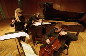 Atlanta Chamber Players, Amy Porter, Paula Peace, and David Hancock, performing George Crumb's "Voice of the Whale," a piece that incorporates the sound of humpbacked whales, Florence Kopleff Recital Hall, Georgia State University, Atlanta, Georgia, February 11, 1994.