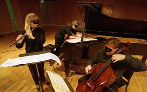 Atlanta Chamber Players, Amy Porter, Paula Peace, and David Hancock, performing George Crumb's "Voice of the Whale," a piece that incorporates the sound of humpbacked whales, Florence Kopleff Recital Hall, Georgia State University, Atlanta, Georgia, February 11, 1994.