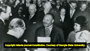 Martin Luther King, Jr. with his wife Coretta Scott King, being congratulated by Norway's King Olav and Crown Prince Harald, after receiving the Nobel Peace Prize, Oslo, Norway, December 10, 1964.