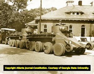 Two armored transport vehicles, Fort Benning, Georgia, 1940s?