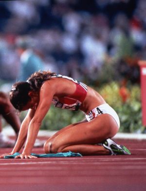 Track runner resting during the 1996 Olympics, Atlanta, Georgia, 1996.