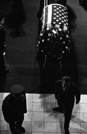 President Richard Nixon standing before Richard Russell's open casket, Georgia State Capitol, Atlanta, January 23. 1971.