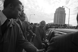 President Richard Nixon getting into a limousine, leaving Richard Russell's funeral service, Georgia State Capitol, Atlanta, January 23, 1971.