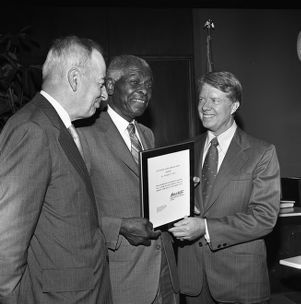 Governor Jimmy Carter presenting Dr. Benjamin E. Mays with the Outstanding Older Georgian Award, Morehouse College, Atlanta, Georgia, August 6, 1971.