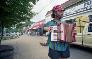 Maurice Wolfgang playing the accordion in Little Five Points, Atlanta, Georgia, June 27, 1991.