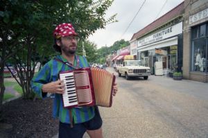Maurice Wolfgang playing the accordion in Little Five Points, Atlanta, Georgia, June 27, 1991.