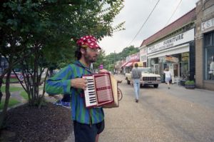 Maurice Wolfgang playing the accordion in Little Five Points, Atlanta, Georgia, June 27, 1991.