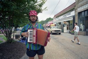 Maurice Wolfgang playing the accordion in Little Five Points, Atlanta, Georgia, June 27, 1991.