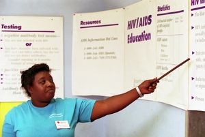 Diane Bledson teaching children AIDS/HIV awareness, Harrison Square public housing, Gainesville, Georgia, July 28, 1992.