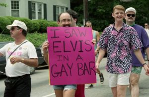 David Zecca holding sign "I Saw Elvis in a Gay Bar," Gay Pride Day parade, Atlanta, Georgia, June 6, 1991.