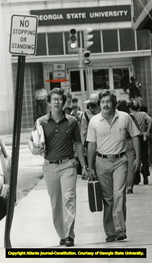 Georgia State University students walking up Exchange Place, Atlanta, Georgia, July 26, 1979.