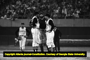 First Major League Baseball game in the southeast (Atlanta Braves against the Pittsburgh Pirates), Pirates conferring on the pitcher's mound, Atlanta Stadium, Atlanta, Georgia, April 12, 1966.