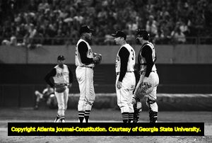 First Major League Baseball game in the southeast (Atlanta Braves against the Pittsburgh Pirates), Pirates conferring on the pitcher's mound, Atlanta Stadium, Atlanta, Georgia, April 12, 1966.
