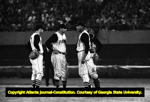 First Major League Baseball game in the southeast (Atlanta Braves against the Pittsburgh Pirates), Pirates conferring on the pitcher's mound, Atlanta Stadium, Atlanta, Georgia, April 12, 1966.
