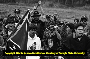 White supremacy activists with Confederate flags protesting the Forsyth County freedom march, Georgia, January 17, 1987.