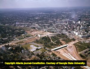 Aerial view over the construction of the Downtown Connector near the Georgia State Capitol building, looking southwest, Atlanta, Georgia, September 27, 1961.