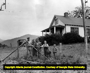 Bryson Family living in a farmhouse, Rabun Gap, Georgia, ca. 1930s.