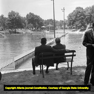 Onlookers viewing the newly integrated Lake Clara Meer, Piedmont Park, Atlanta, Georgia, June 12, 1963.