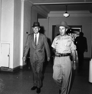 Atlanta Mayor William B. Hartsfield and police escort going to civil rights march, Georgia State Capitol, Atlanta, Georgia, May 17, 1960.