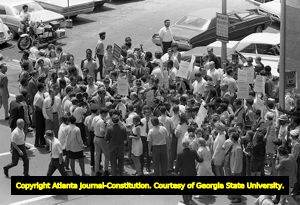 Lester Maddox and his followers picketing at the Atlanta Journal and Constitution building, Atlanta, Georgia, June 4, 1970.