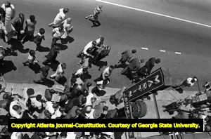 Lester Maddox and his followers picketing at the Atlanta Journal and Constitution building, Atlanta, Georgia, June 4, 1970.