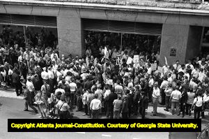 Lester Maddox and his followers picketing at the Atlanta Journal and Constitution building, Atlanta, Georgia, June 4, 1970.
