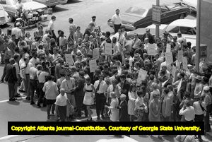 Lester Maddox and his followers picketing at the Atlanta Journal and Constitution building, Atlanta, Georgia, June 4, 1970.