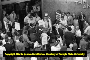 Lester Maddox and his followers picketing at the Atlanta Journal and Constitution building, Atlanta, Georgia, June 4, 1970.