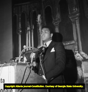 Muhammad Ali at a press conference discussing his retirement and the Atlanta Sports Hall of Fame proposal, 1976