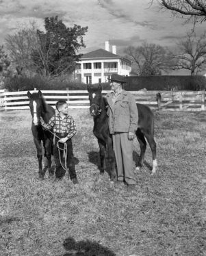 Colonel William O. Poindexter with a family member and horses, Rebel House (formerly the Rutlidge Home plantation), LaGrange, Georgia, January 27, 1959.
