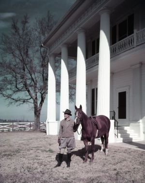 Colonel William O. Poindexter with his horse and home, Rebel House (formerly the Rutlidge Home plantation), LaGrange, Georgia, January 27, 1959.