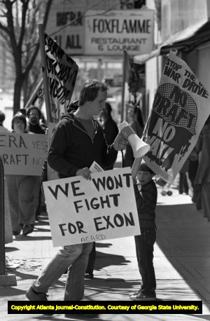 Atlanta Committee Against Registration and the Draft (ACAD) protesters in front of Jimmy Carter's campaign headquarters, Atlanta, Georgia, March 15, 1980.