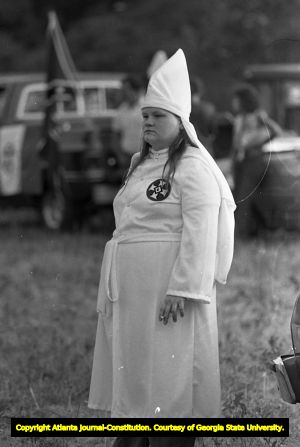 Woman in Klan robe at a Ku Klux Klan rally in Buchanan, Georgia, June 20, 1981.