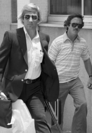 Police officers leaving Atlanta's F.B.I. headquarters following a hostage situation, Atlanta, Georgia, June 29, 1981.