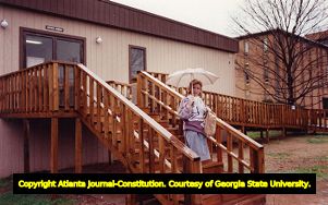 Chemistry instructor Marianne Scale leaving the science annex at Kennesaw State University (then Kennesaw State College), Kennesaw, Georgia, February 22, 1990.
