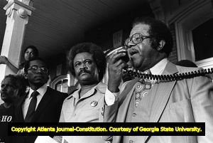 Tyrone Brooks and other civil rights leaders speaking at a civil rights rally, Social Circle, Georgia, February 20, 1982.