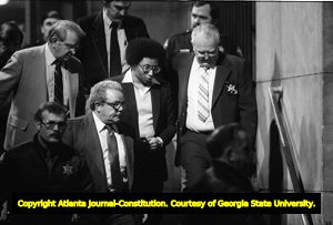 Serial murderer Wayne Williams leaving court in handcuffs, Atlanta, Georgia, February 24, 1982.