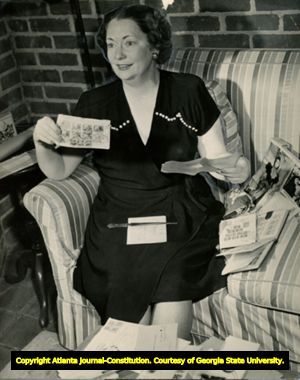 Margaret Mitchell opening her fan mail, Atlanta, Georgia, August 1949.