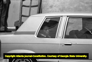 Serial murderer Wayne Williams in the back of a police vehicle, Atlanta, Georgia, February 24, 1982.