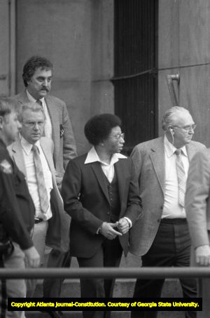 Serial murderer Wayne Williams leaving court in handcuffs, Atlanta, Georgia, February 24, 1982.