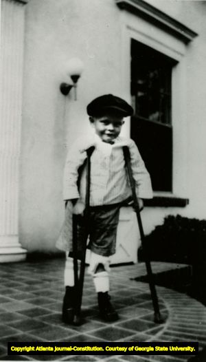 Boy with crutches, patient at the Scottish Rite Hospital for Crippled Children,Decatur, Georgia, 1920s?