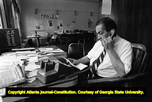 Manuel Maloof on the phone in his office, Atlanta, Georgia, October 30, 1980.