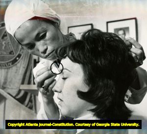 Acupuncturist giving a woman treatment, Atlanta, Georgia, November 1973.