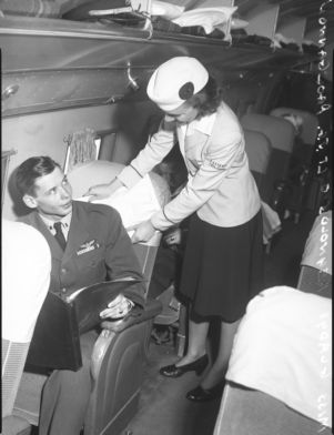 Eastern Airlines flight attendant Gladys Reynolds, with Lt. J.G. Paul Gannon, Atlanta, Georgia, late 1940s?