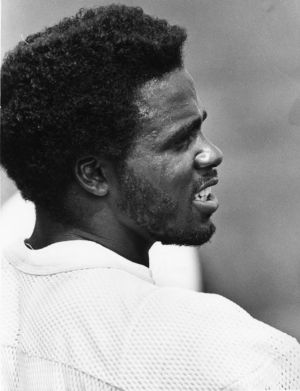 Falcons' defensive back Frank Reed taking a breather on the sidelines during training camp, Atlanta, Georgia, August 14, 1980.