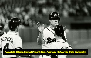 Atlanta Braves Dale Murphy is congratulated by bat boy after his home run (376) to become the all-time Atlanta Braves home-run king, Atlanta, Georgia, August 1989.