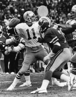 Dallas Cowboys' quarterback Danny White stands tall in the pocket against the Falcons' rush, Atlanta, Georgia, January 4, 1981.